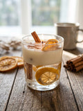 bougie artisanale avec orange cannelle et pin d'épices